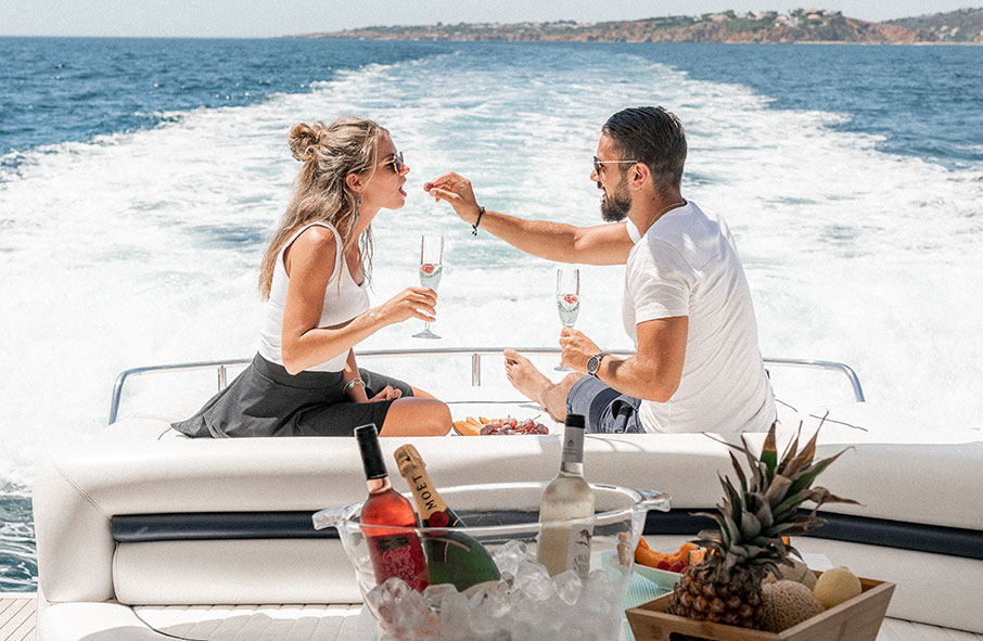 Couple Enjoying Food Aboard a Yacht