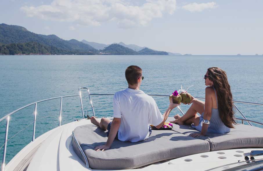 Couple Drinking Cocktails on Yacht Charter