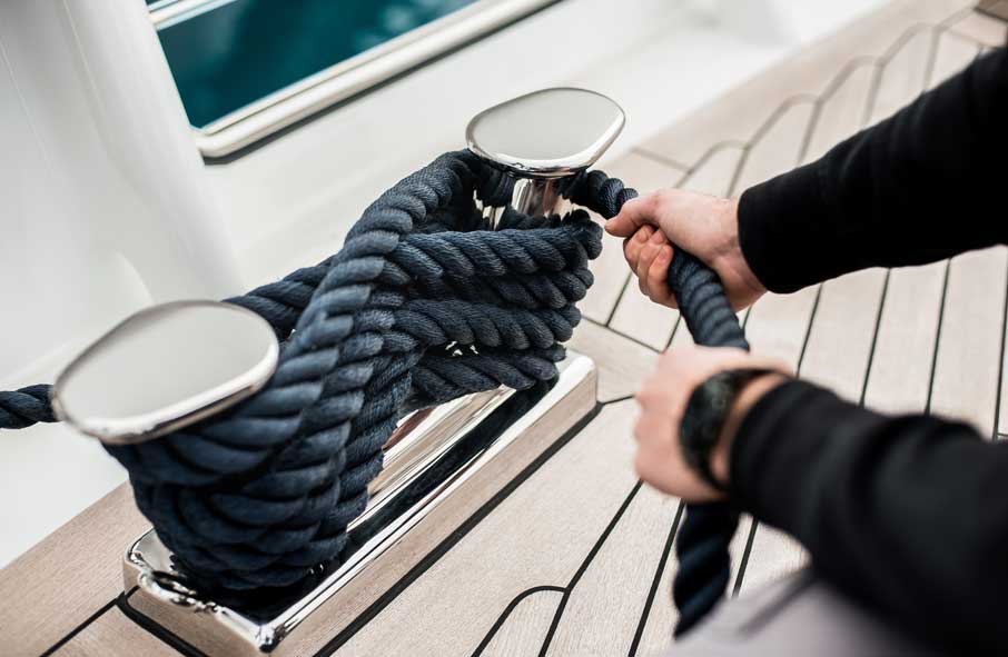 Deck Hand Tying a Knot