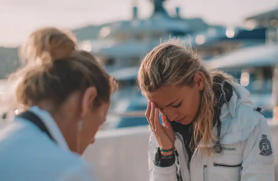 Yacht doctor with sick crew member