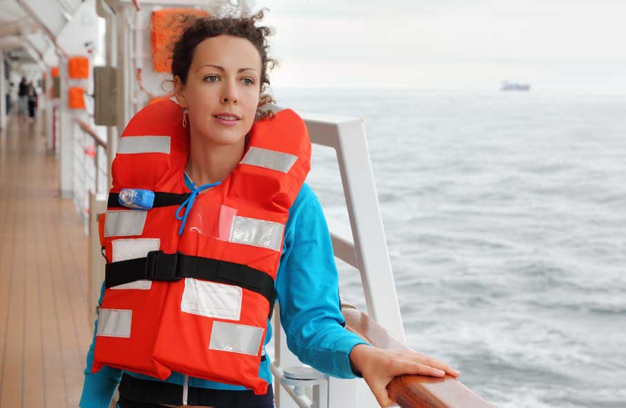 Female Crew Member Wearing Life Jacket